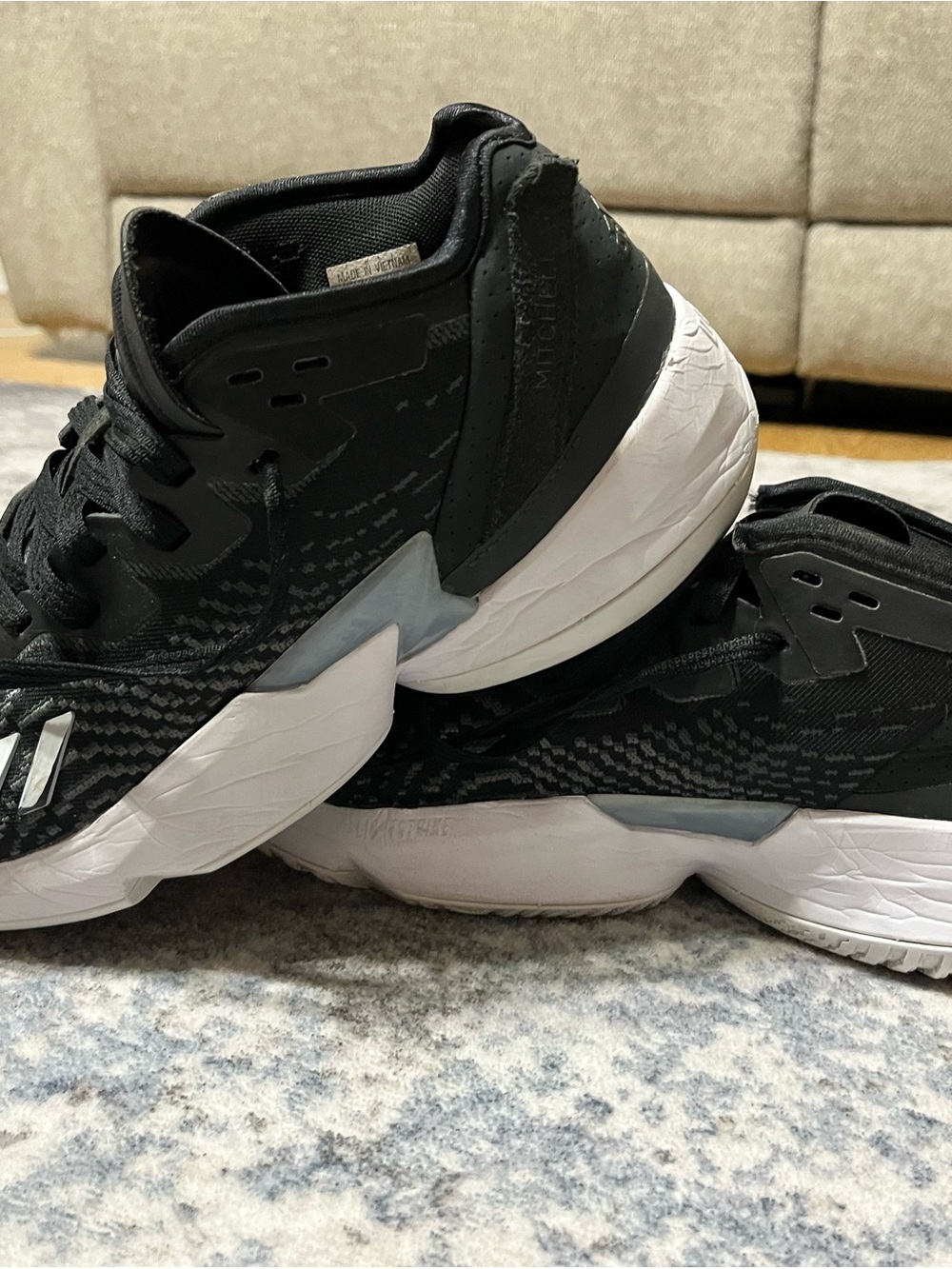 adidas Men’s Donovan Mitchell Black and White Athletic Sneakers
